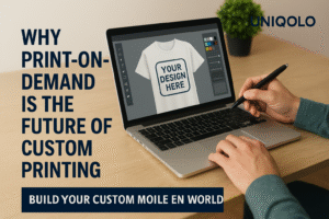 Designer creating custom T-shirt on laptop for UNIQOLO Print-on-Demand.